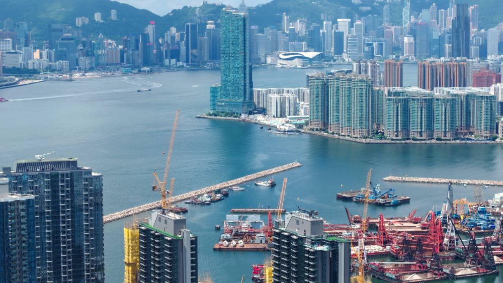 拆息回落大手掃貨潮催旺樓市